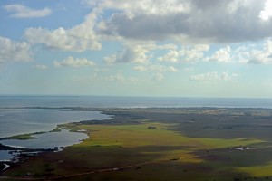 We approach Puerto Lempira from the air. To the left is the lagoon and to the right is visible the dirt air-strip.